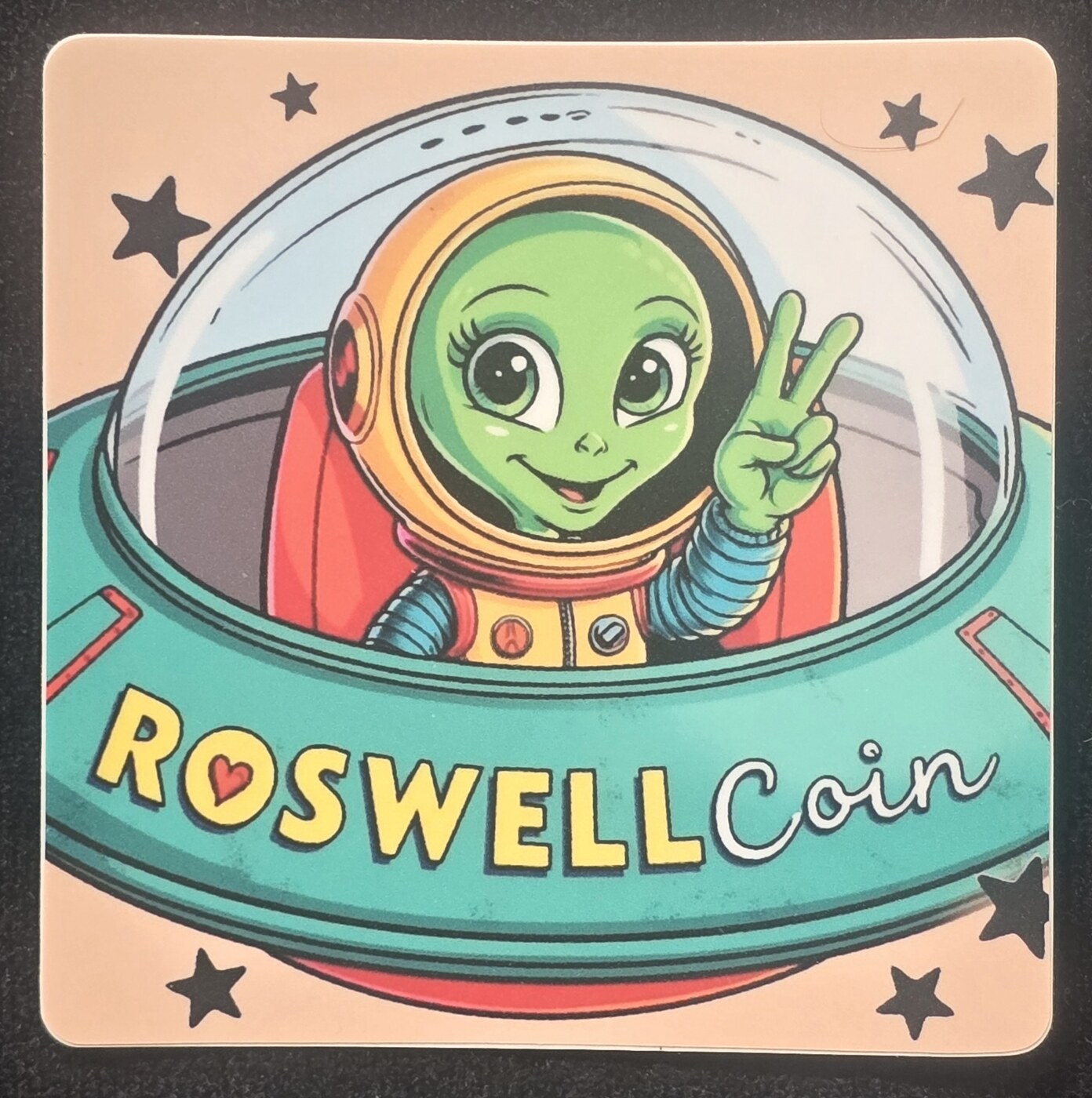 Front of a finished RoswellCoin Edition 001 mission-patch sticker